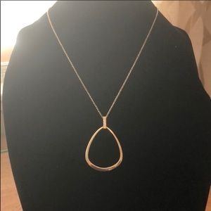 Gold tone mid length necklace. EUC, dress it up